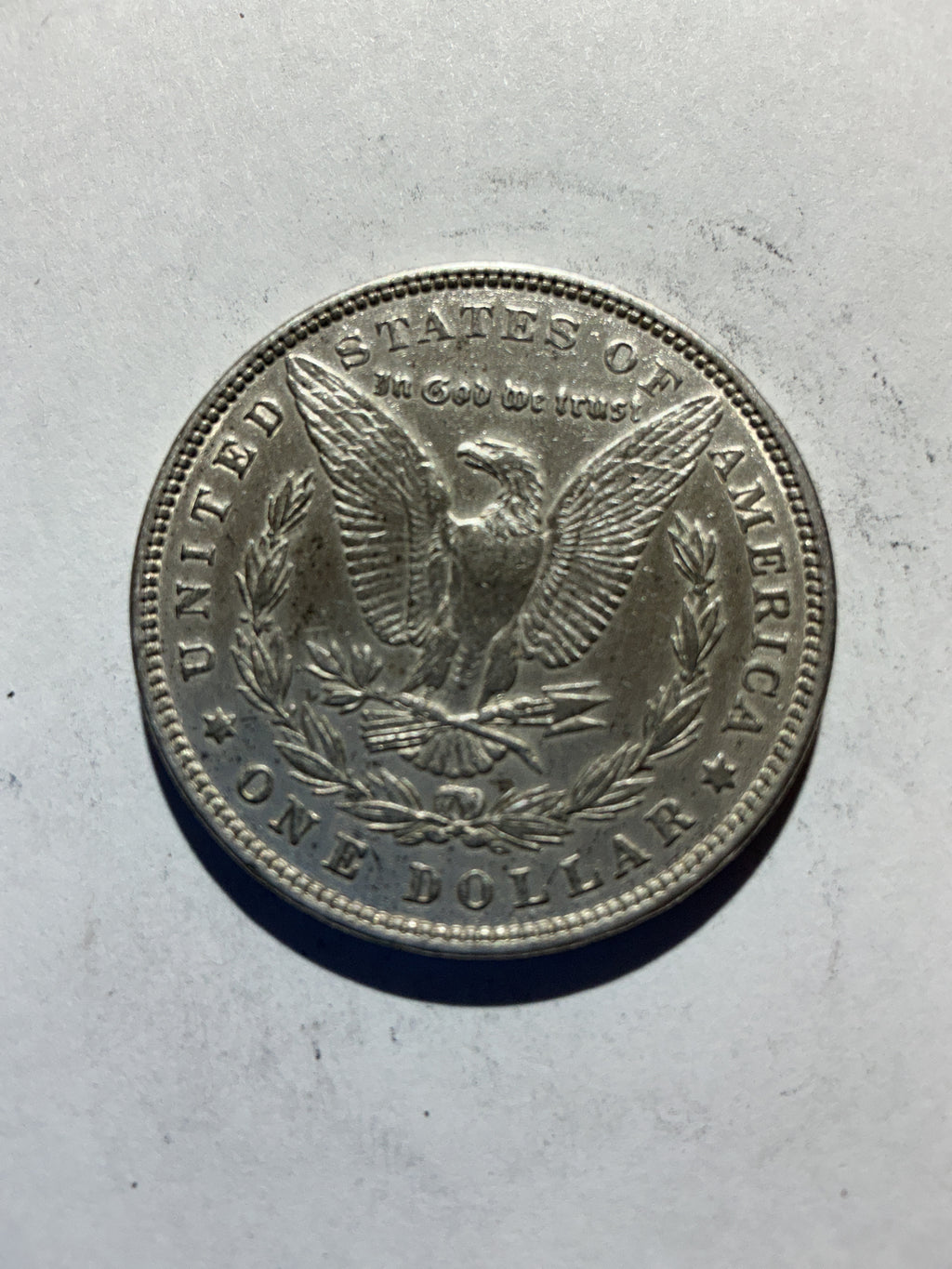 Lot 52, 1879 Morgan silver dollar, AU