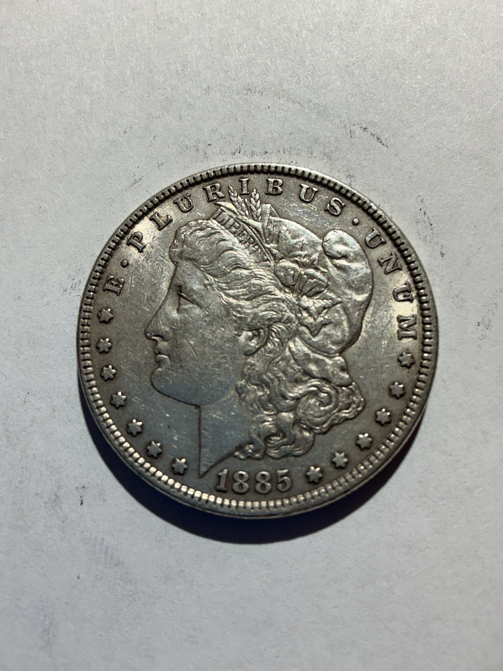 Lot 36, 1885 Morgan silver dollar, AU nice coin