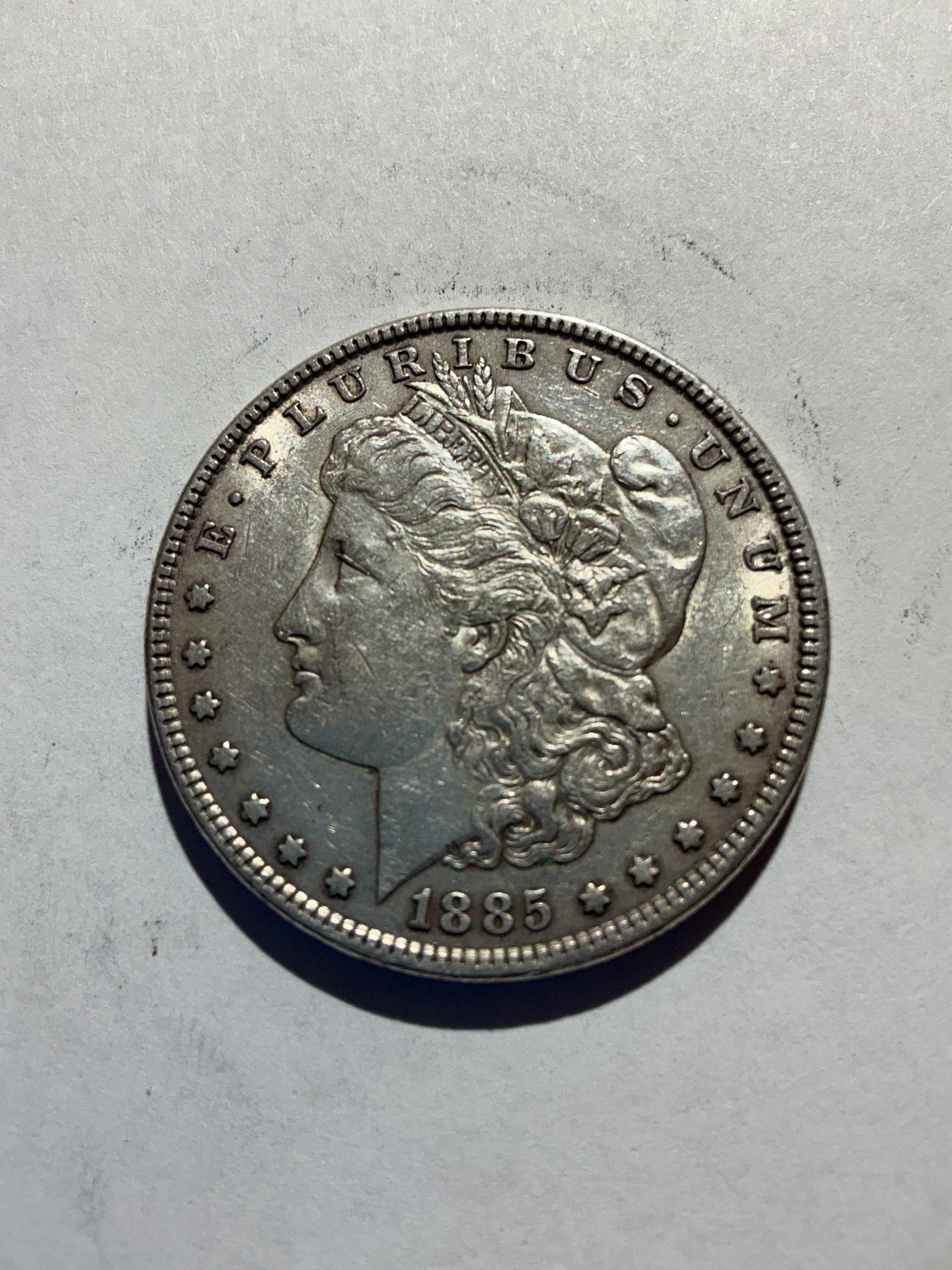 Lot 36, 1885 Morgan silver dollar, AU nice coin