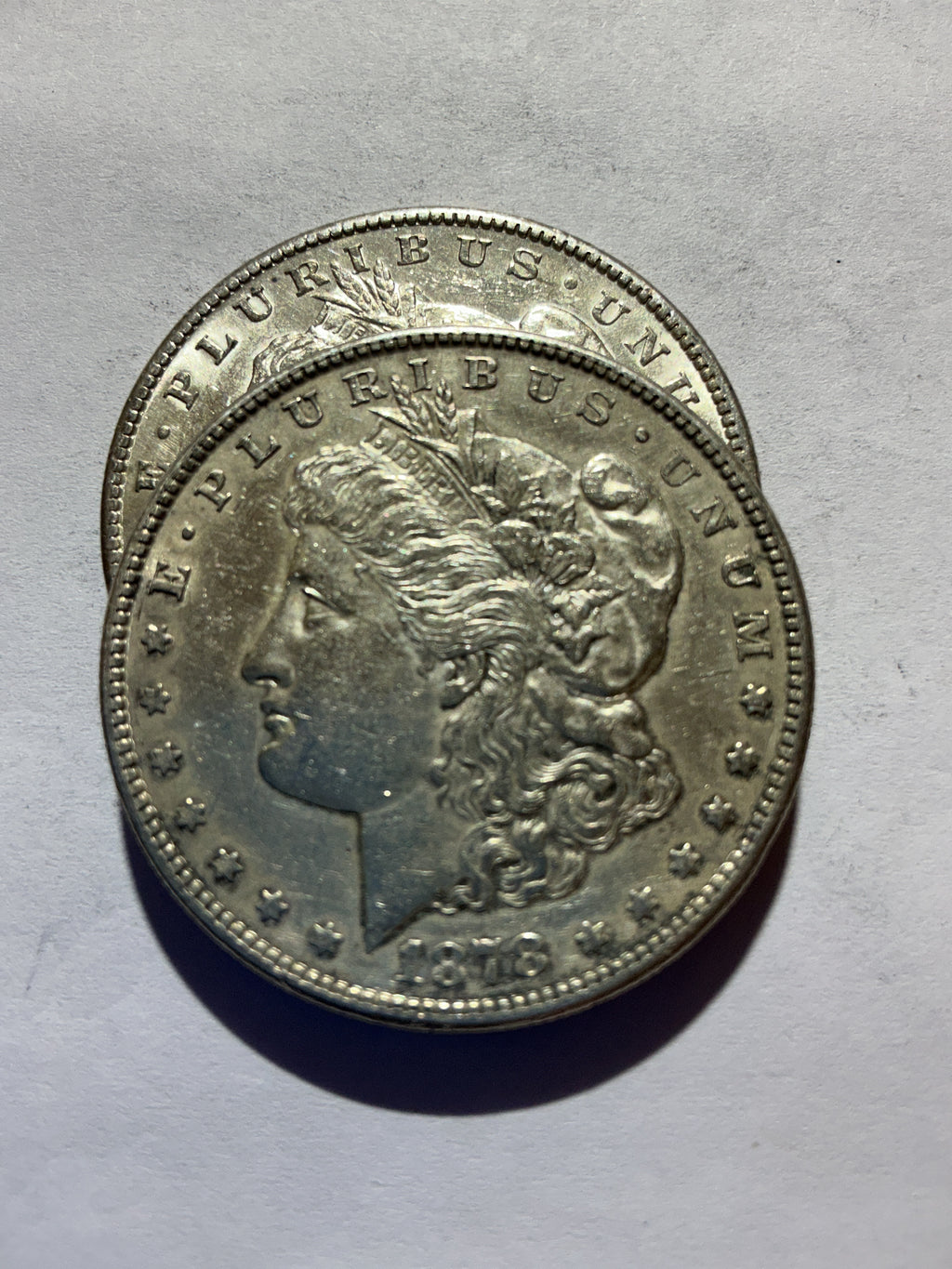 Lot 64, 1878 S Morgan silver dollar, AU