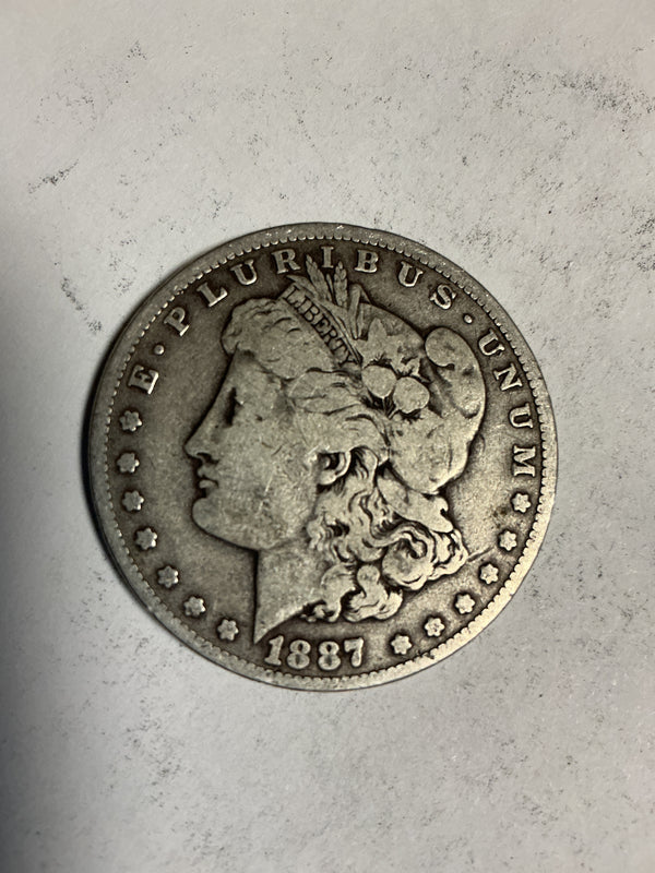 Lot 50, 1887 O Morgan silver dollar