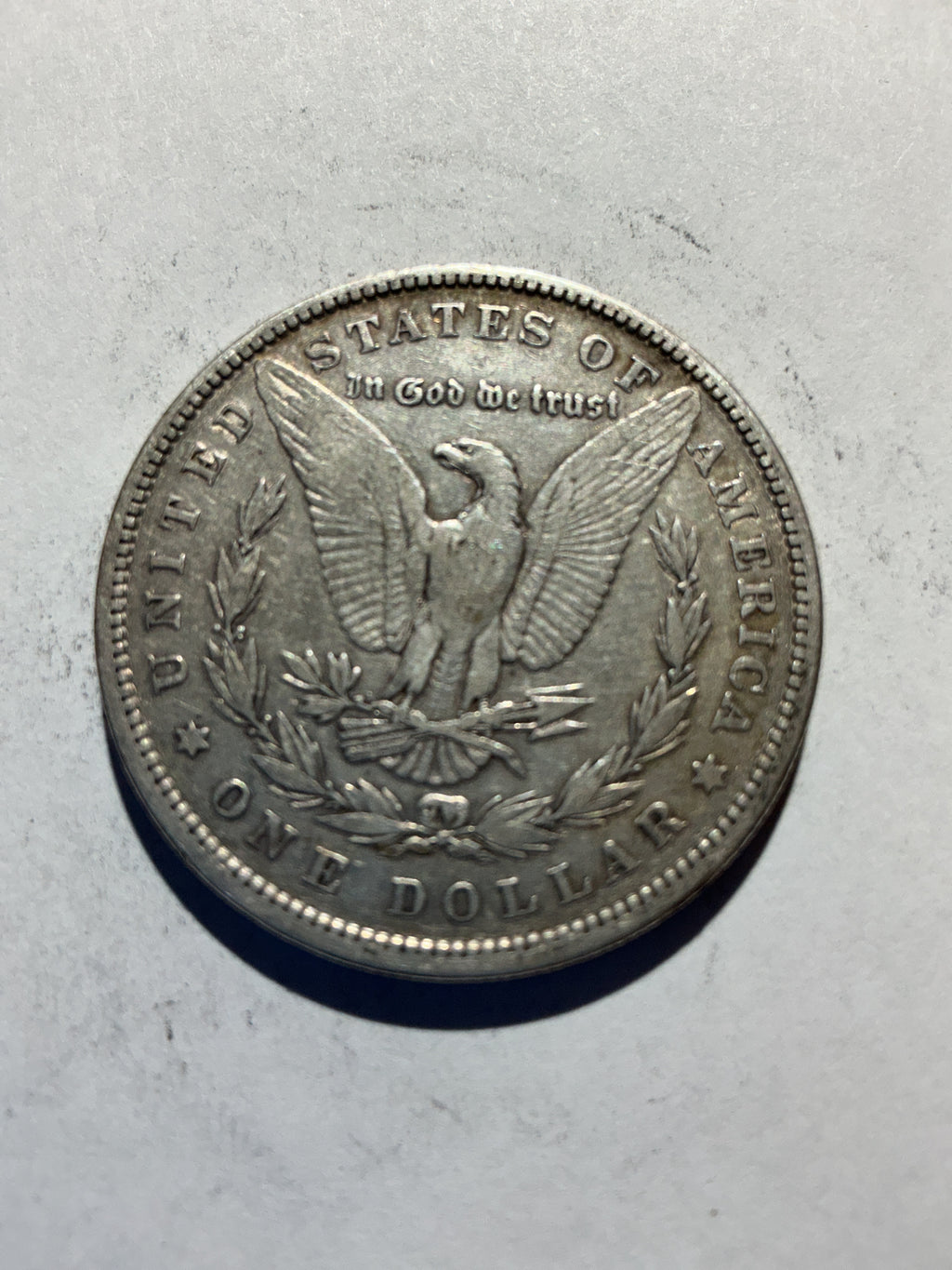 Lot 54, 1879 Morgan silver dollar, xf