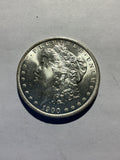 Lot 40, 1900 O Morgan silver dollar, BU