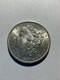 Lot 23, 1890 Morgan silver dollar, AU, nice coin