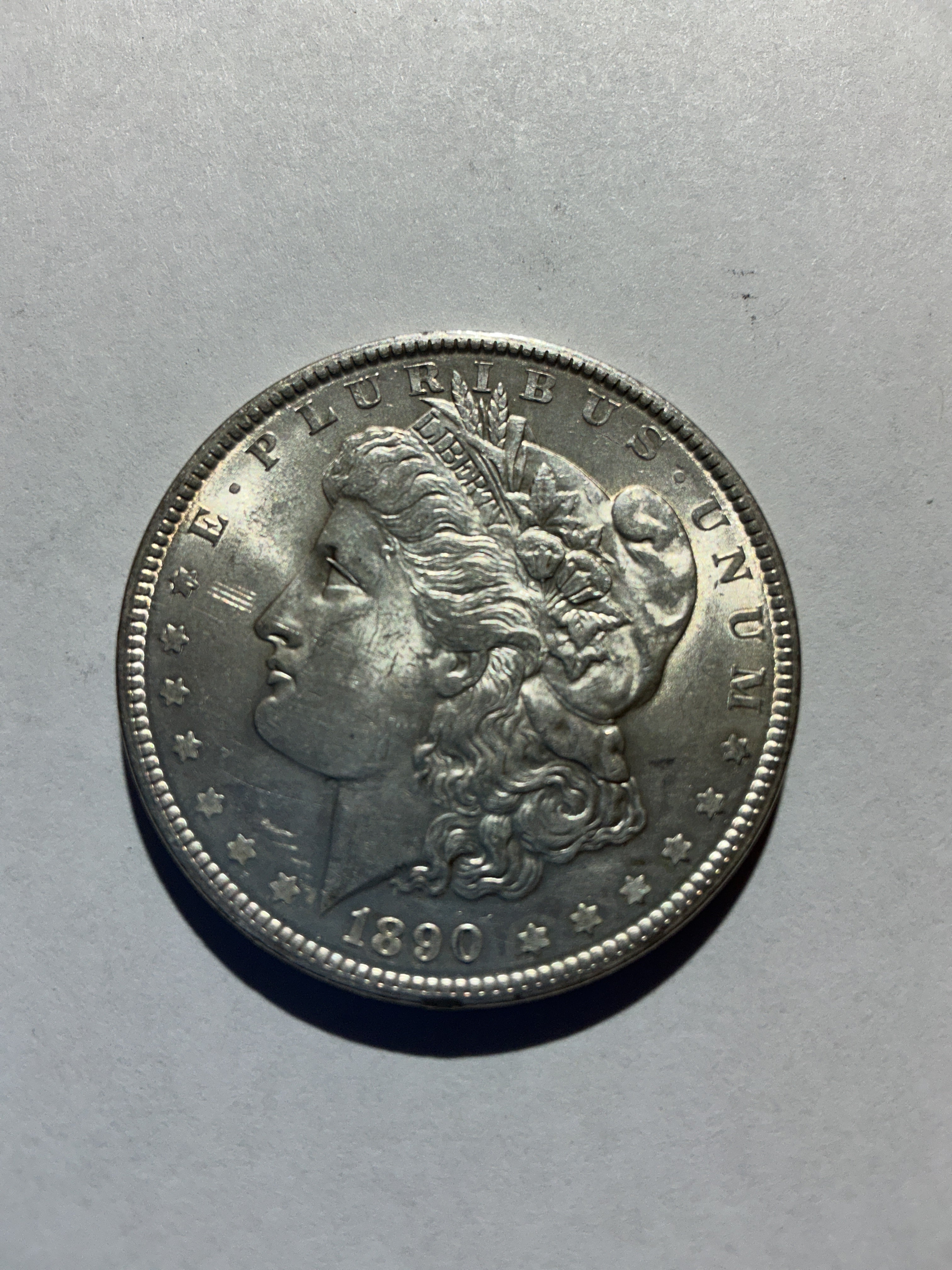 Lot 23, 1890 Morgan silver dollar, AU, nice coin