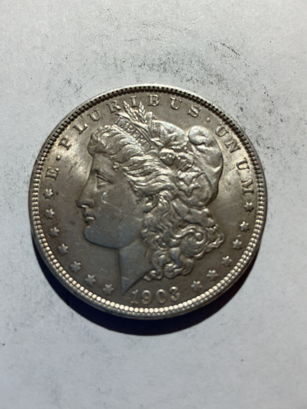 Lot 64, 1903 Morgan silver dollar, AU
