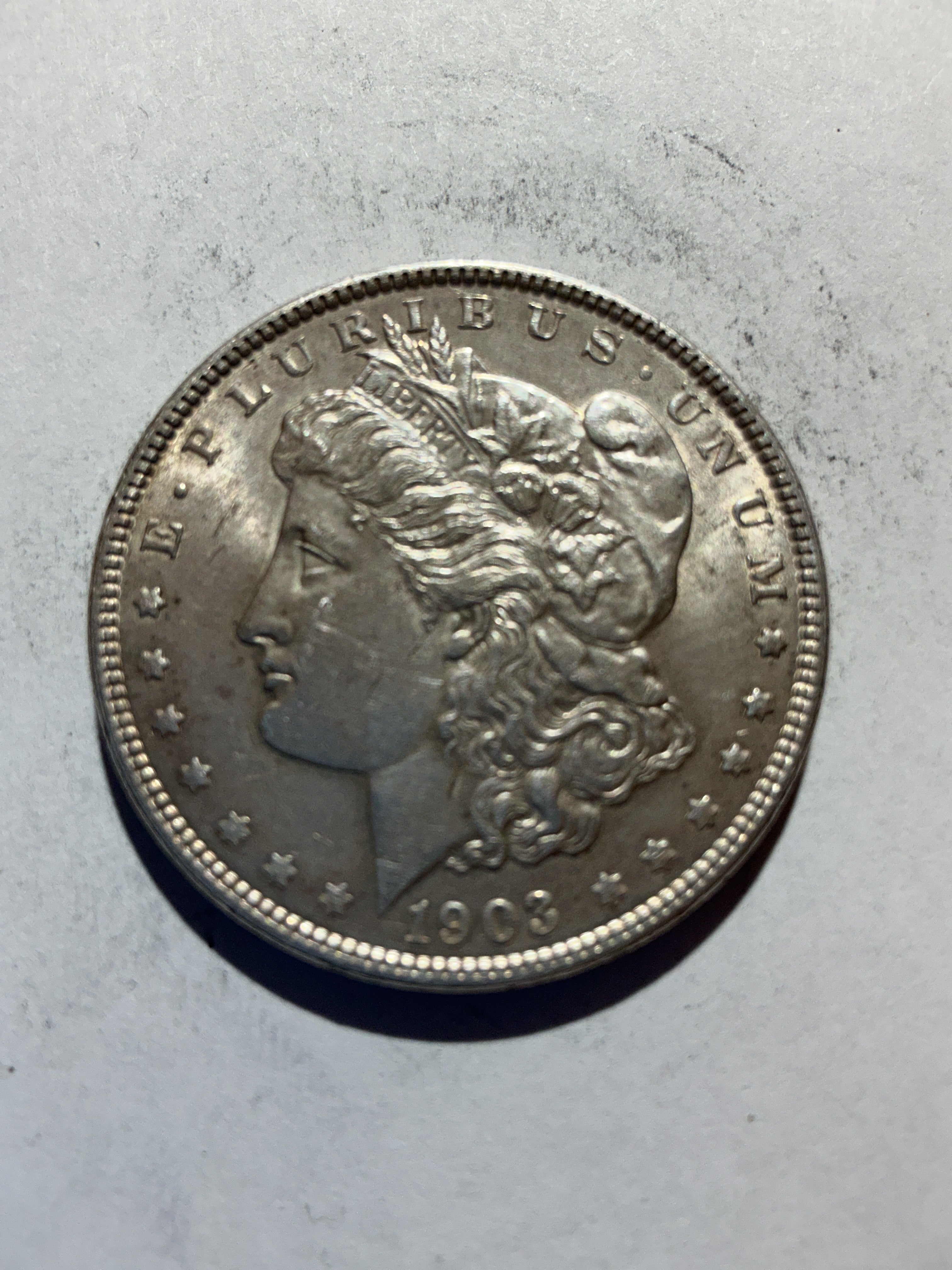 Lot 64, 1903 Morgan silver dollar, AU