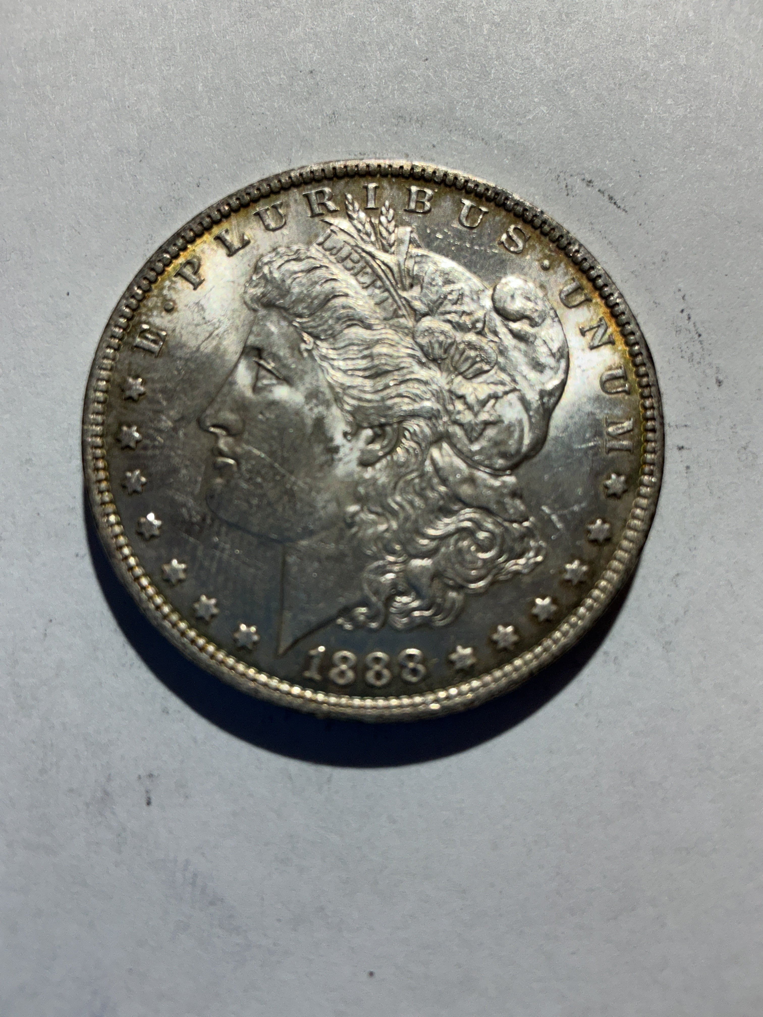 Lot 40, 1888 O Morgan silver dollar, AU