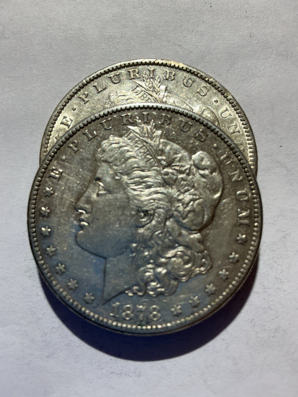 Lot 63, 2 1878 S Morgan silver dollar, AU