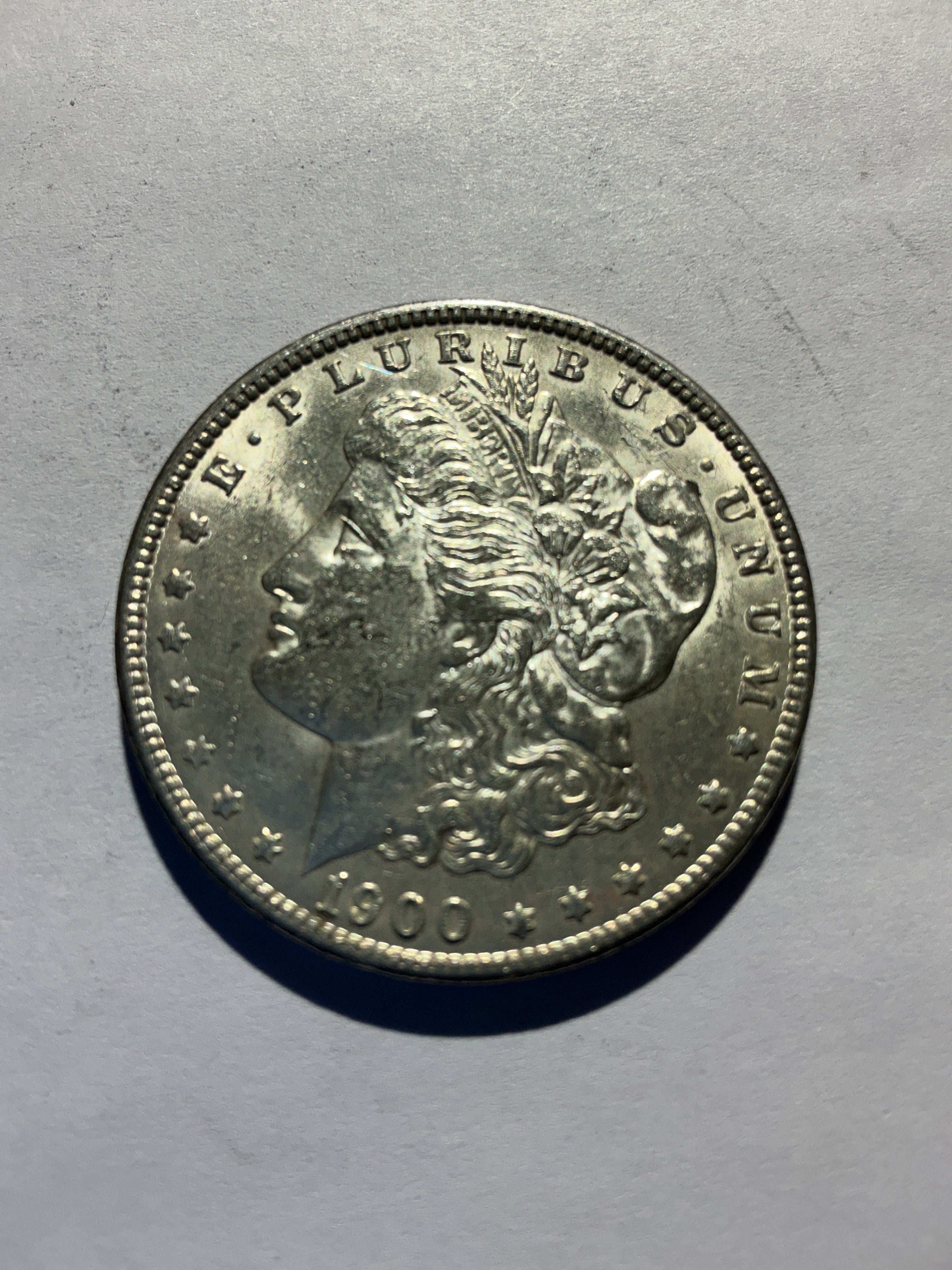 Lot 55, 1900 Morgan silver dollar, AU