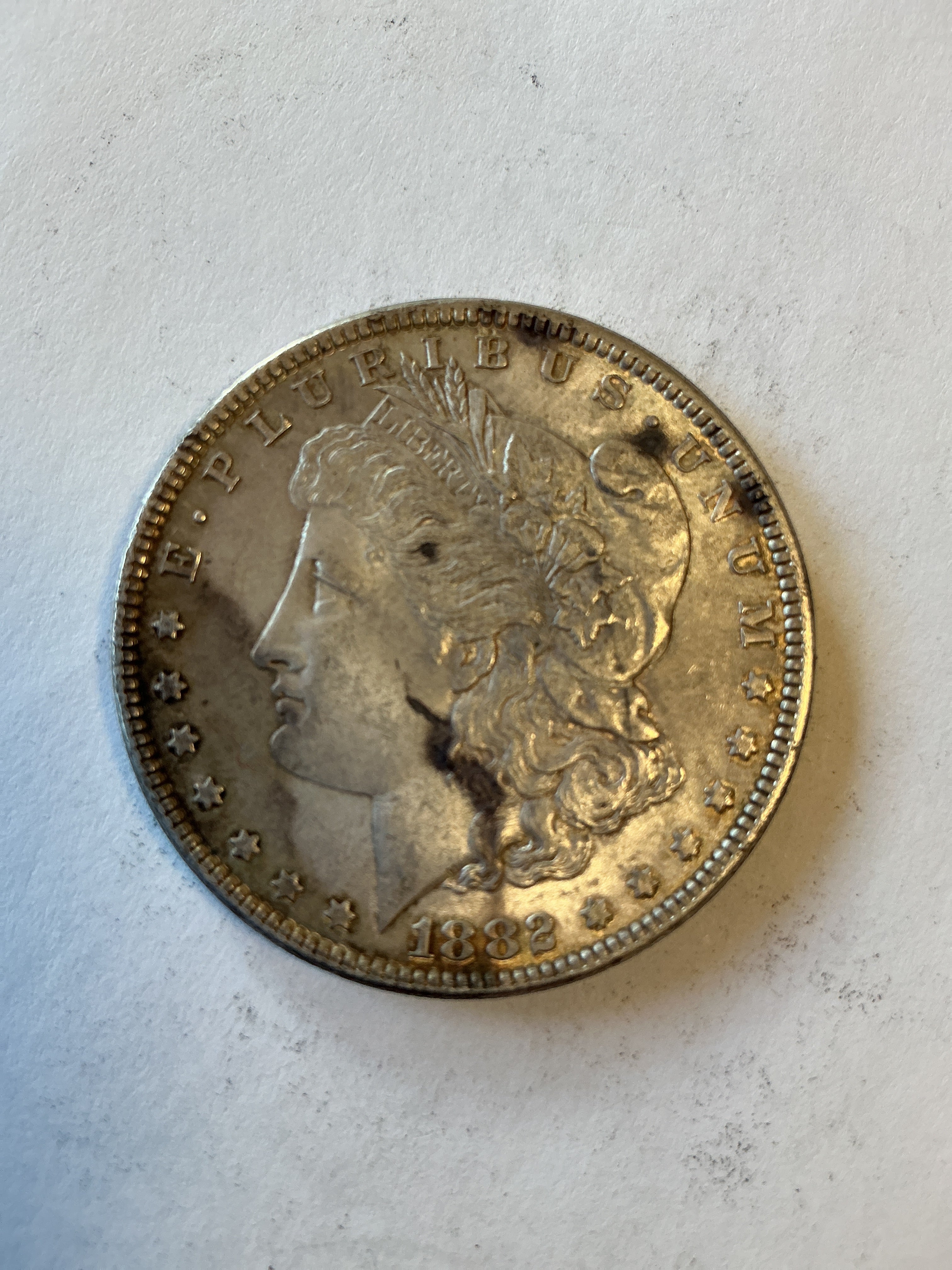 Lot 27 1882 Morgan silver dollar, AU