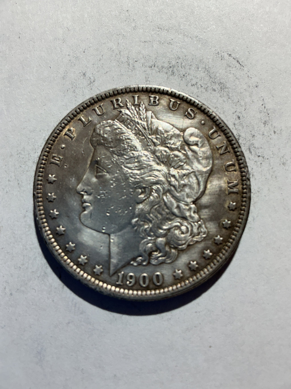 Lot 61, 1900 Morgan silver dollar, AU