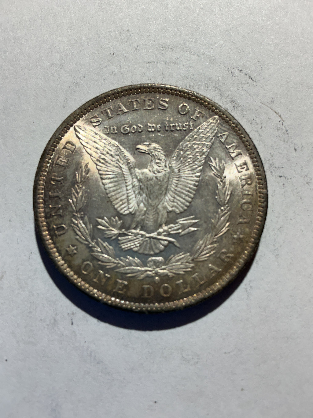 Lot 46, 1884 O Morgan silver dollar, AU