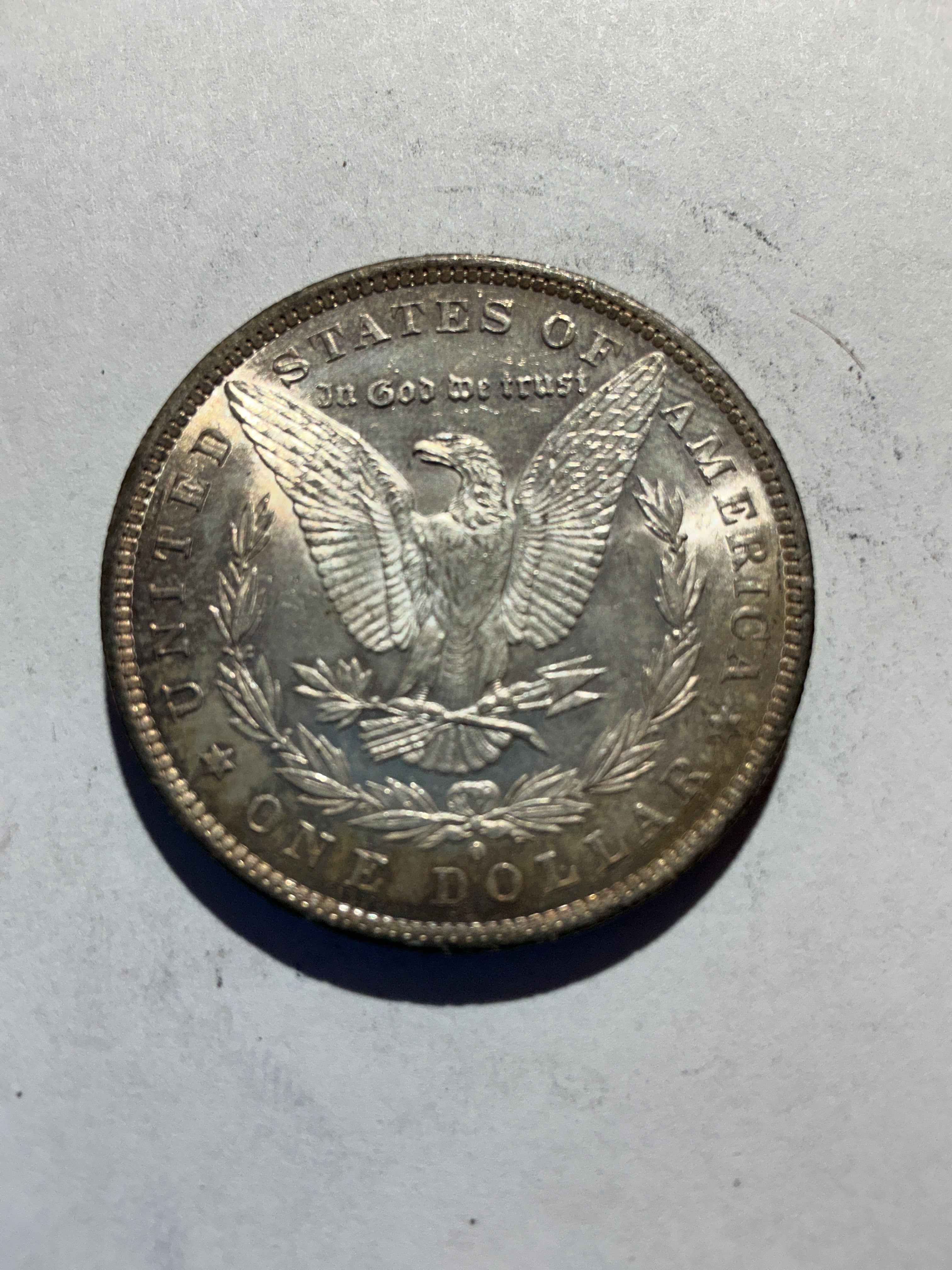 Lot 46, 1884 O Morgan silver dollar, AU