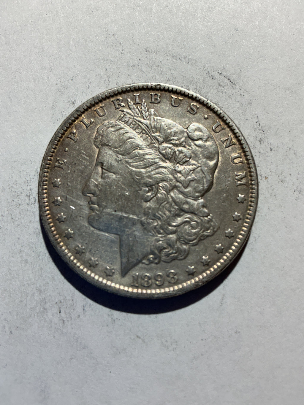 Lot 76, 1898 Morgan silver dollar, xf
