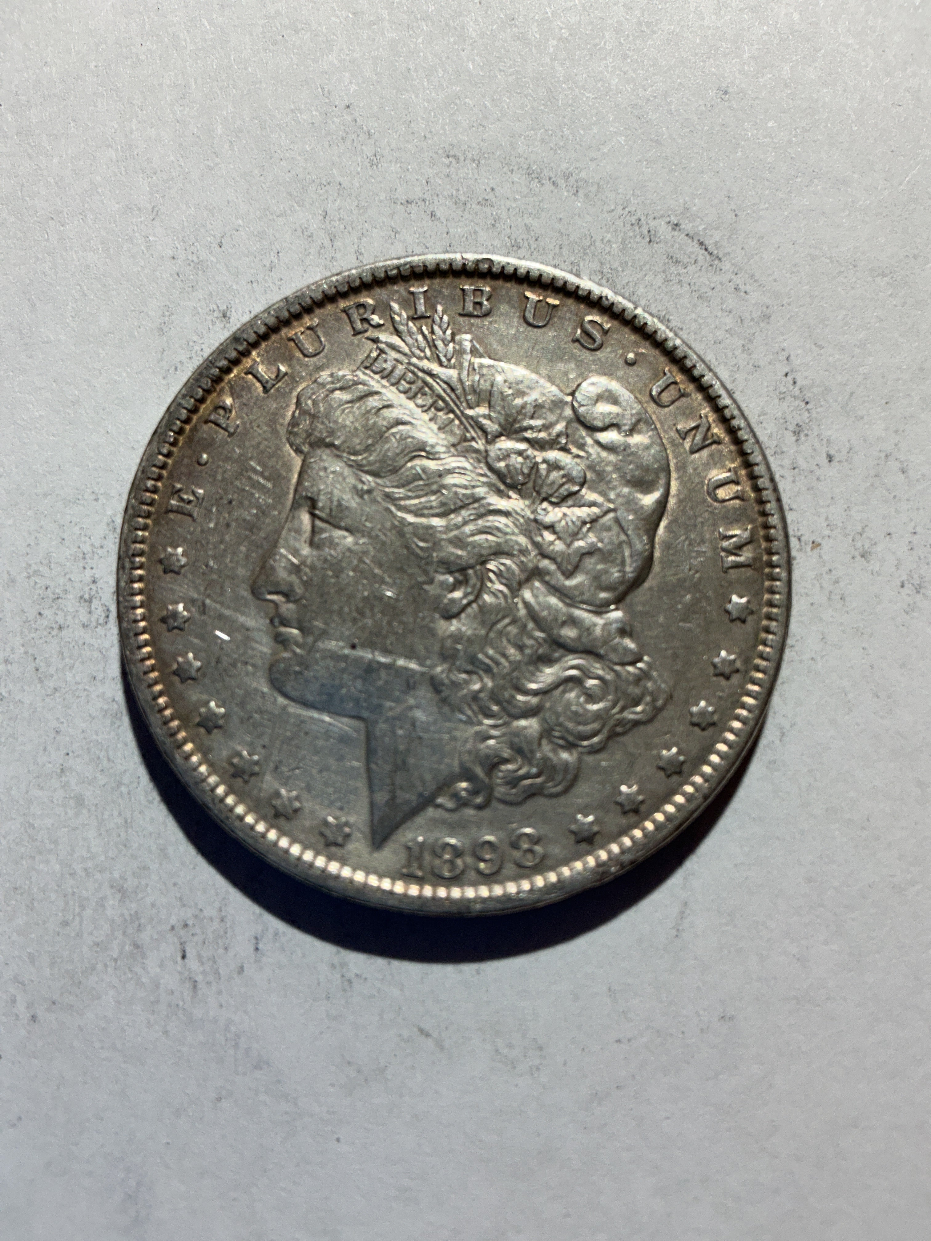 Lot 76, 1898 Morgan silver dollar, xf