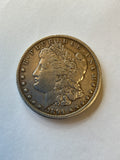 Lot 12, 1894 O Morgan silver dollar, XF