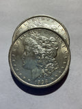 Lot 60, 2 1898 Morgan silver dollar, AU