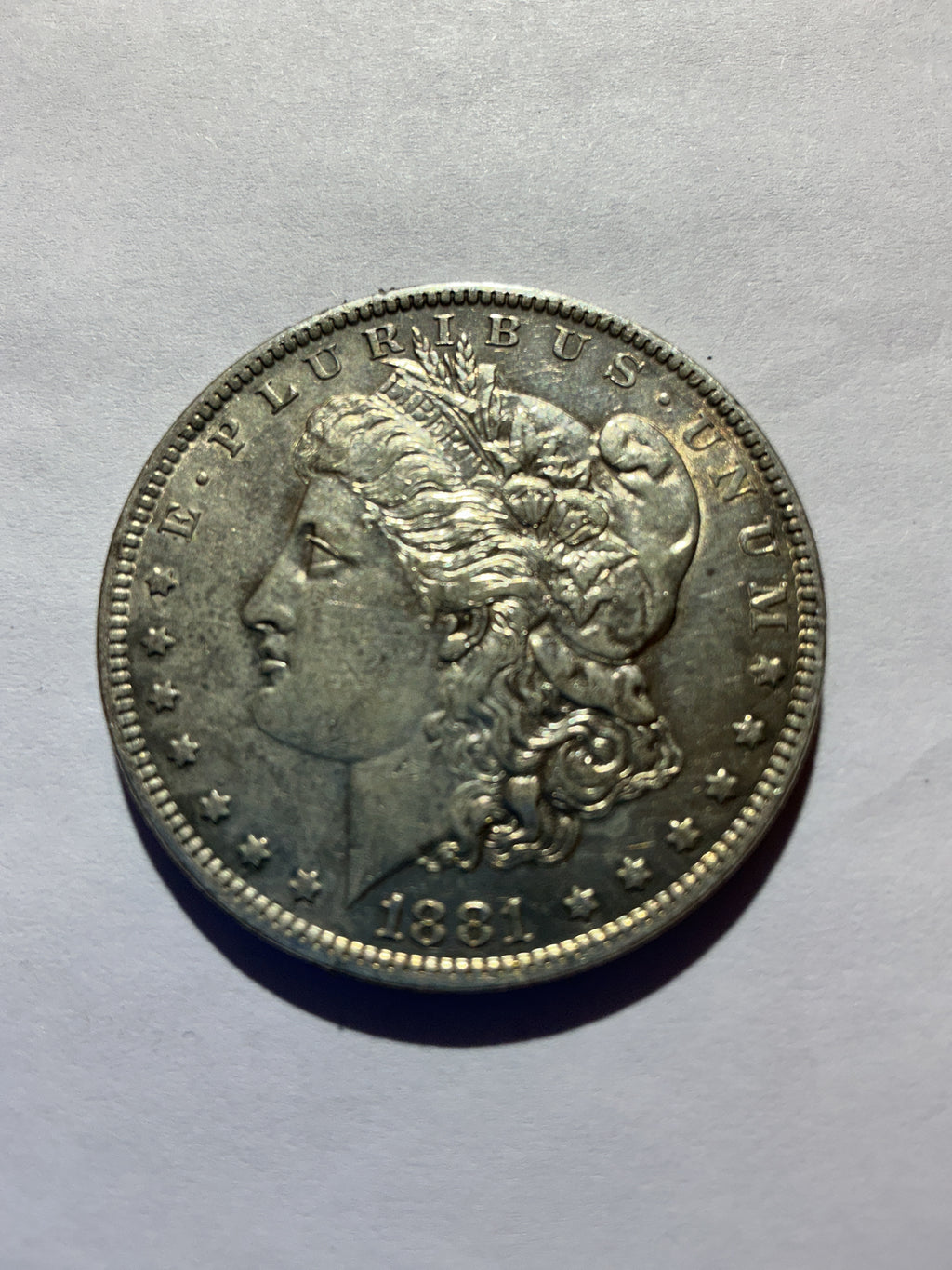 Lot 41, 1881 O Morgan silver dollar, AU