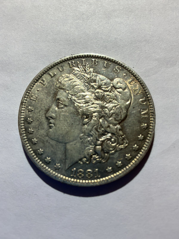 Lot 41, 1881 O Morgan silver dollar, AU