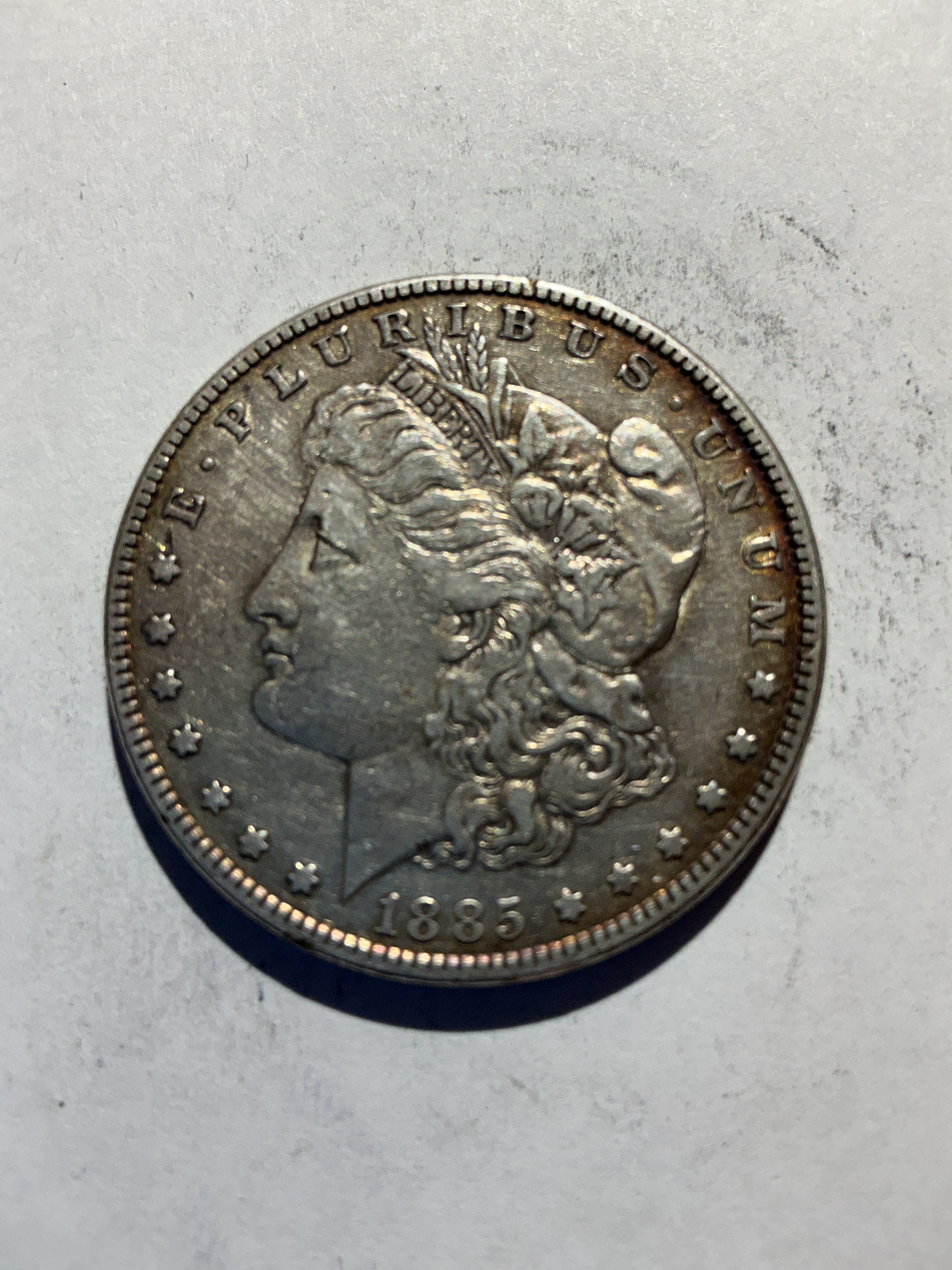 Lot 70, 1885 Morgan silver dollar, xf