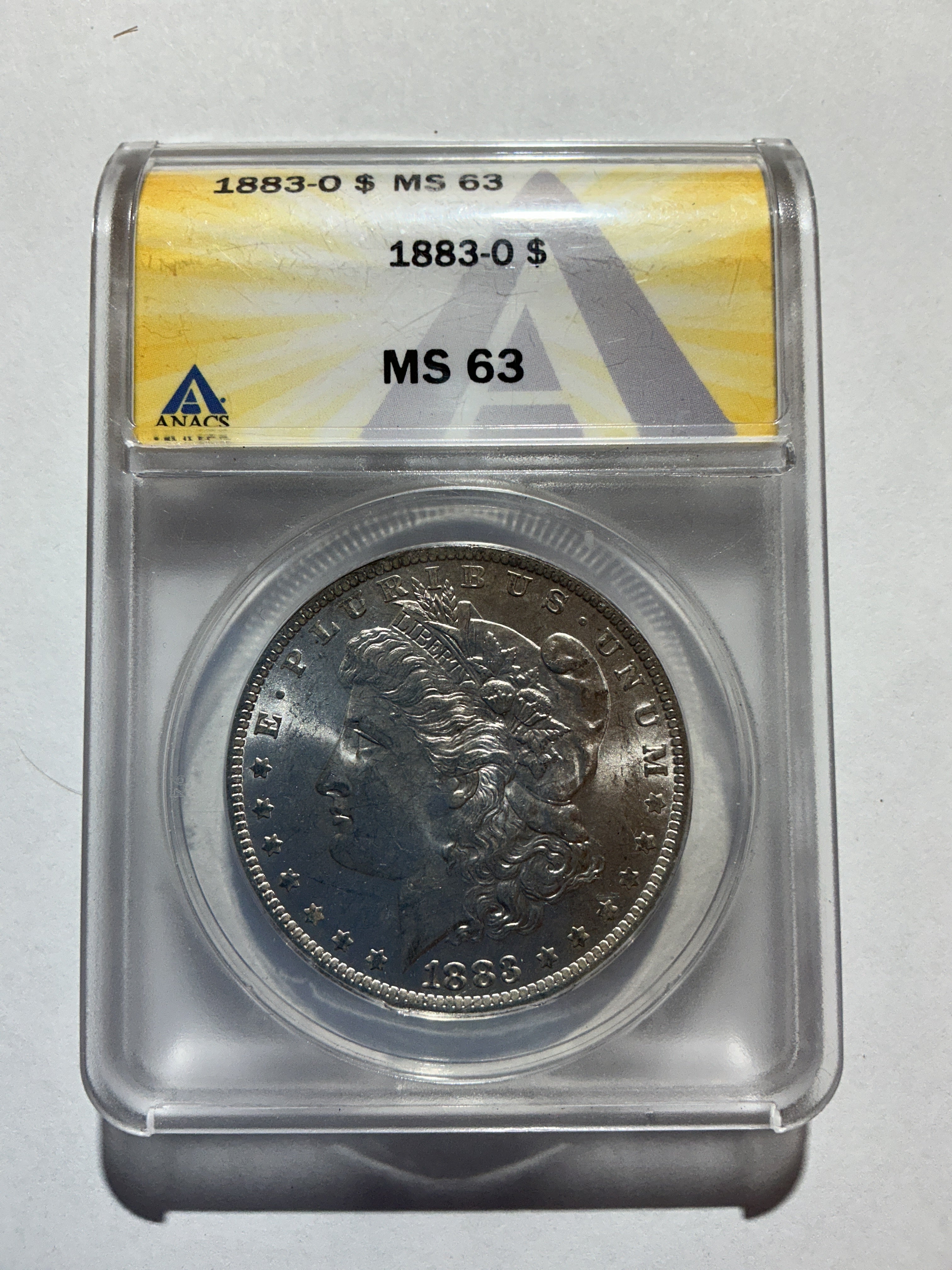 Lot 12, 1883 O Morgan silver dollar, MS63