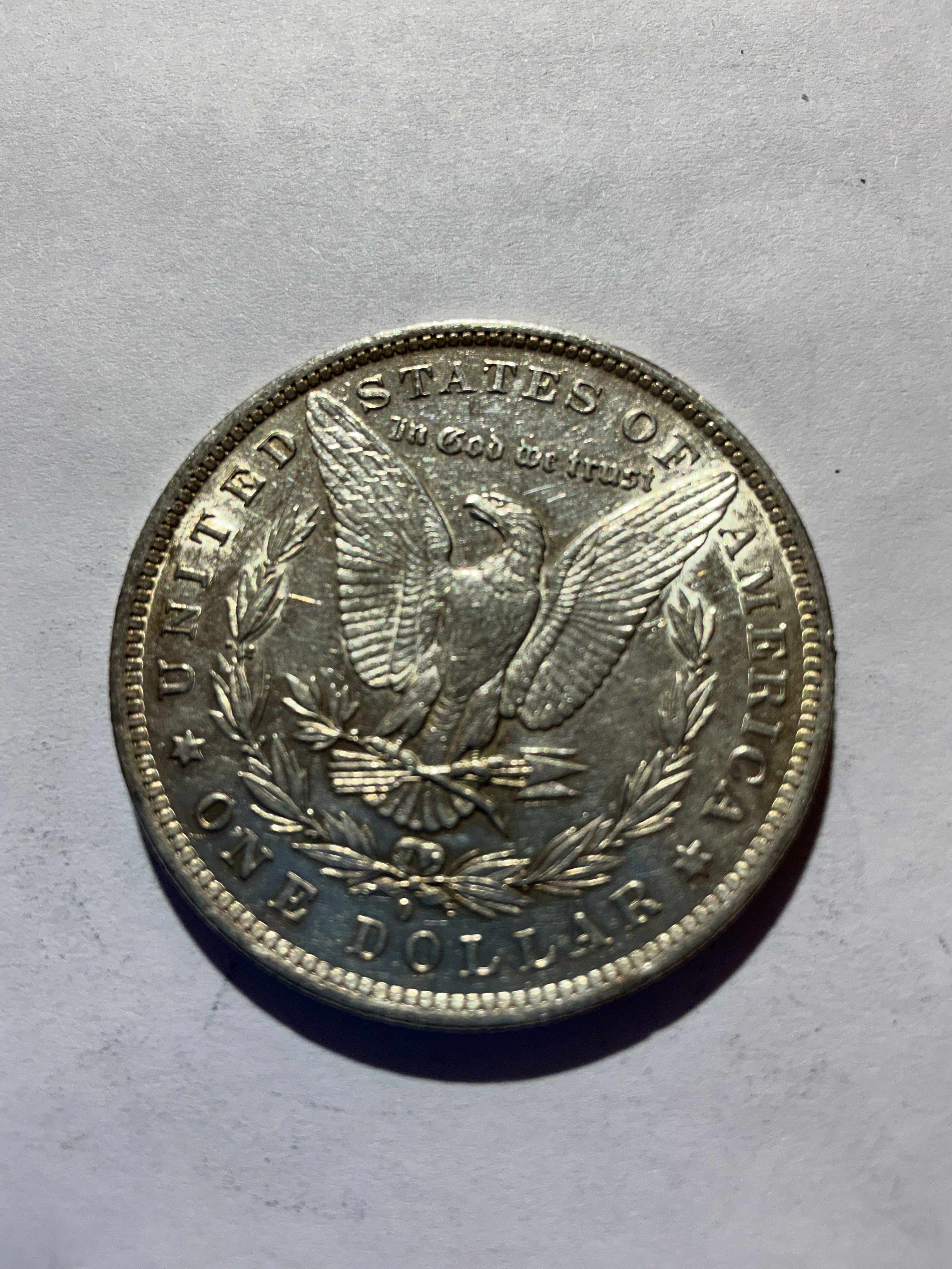 Lot 49, 1884 O Morgan silver dollar, AU