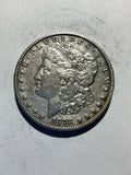 Lot 57, 1878 S Morgan silver dollar, AU