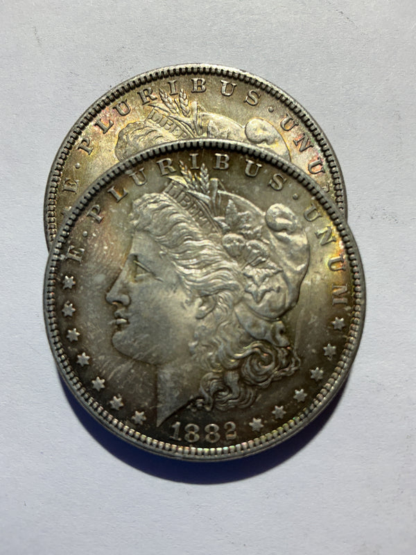 Lot 7, 2, 1882 Morgan silver dollar, AU