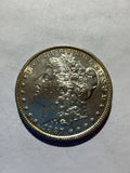 Lot 53, 1887 Morgan silver dollar, AU