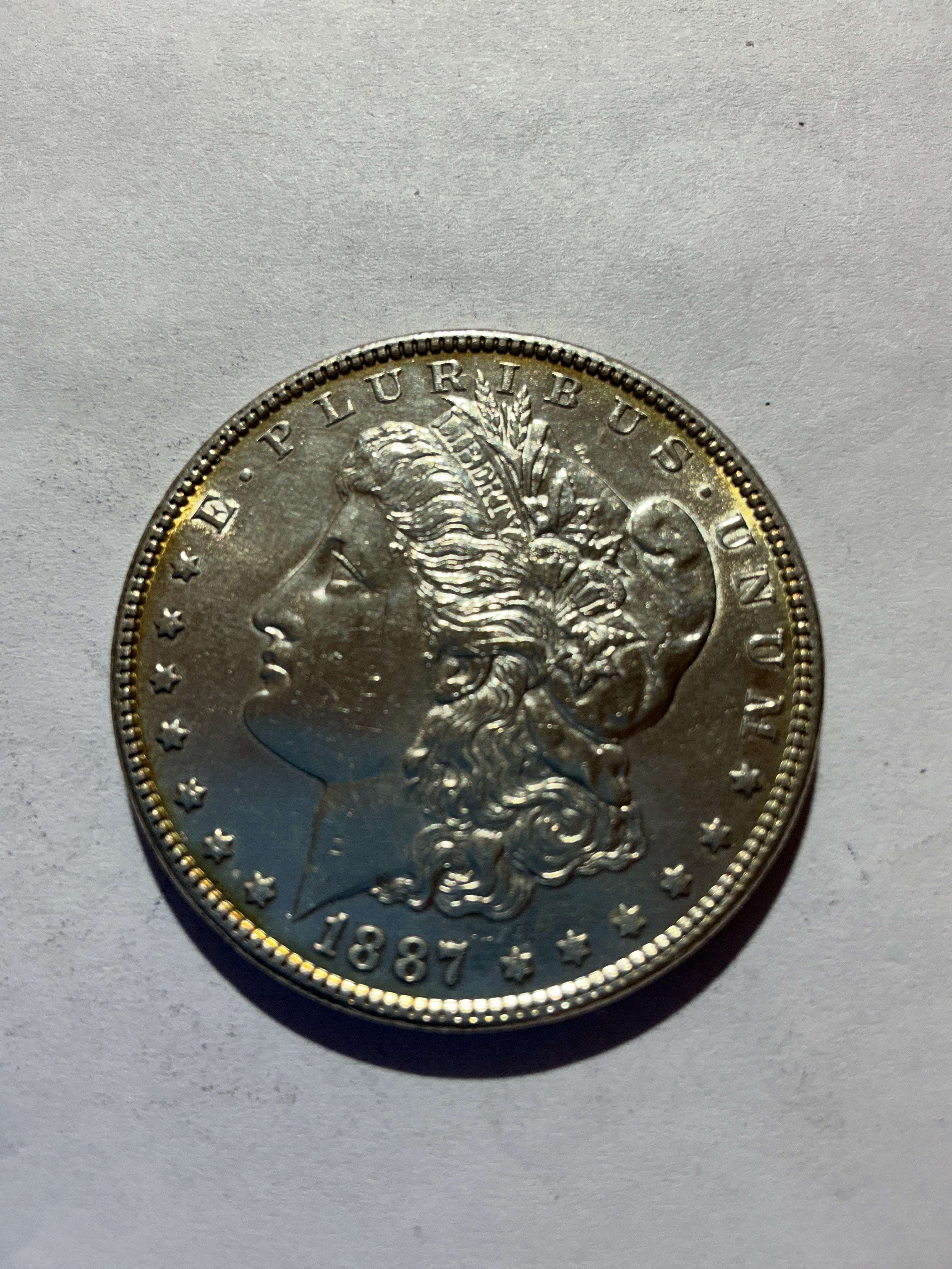 Lot 53, 1887 Morgan silver dollar, AU
