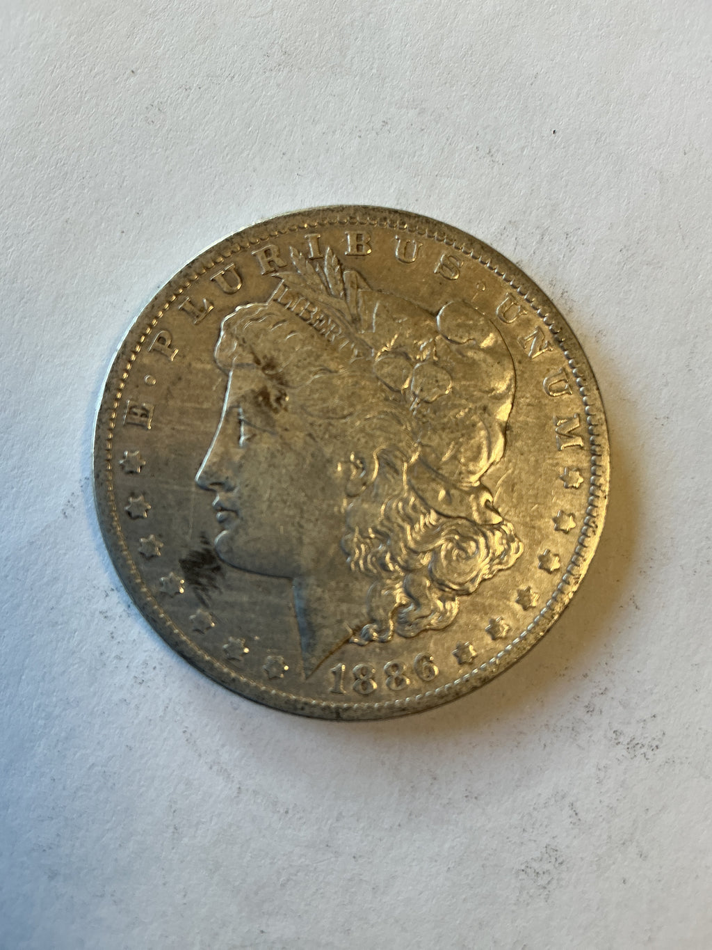 Lot 25 1886 O Morgan silver dollar, xf