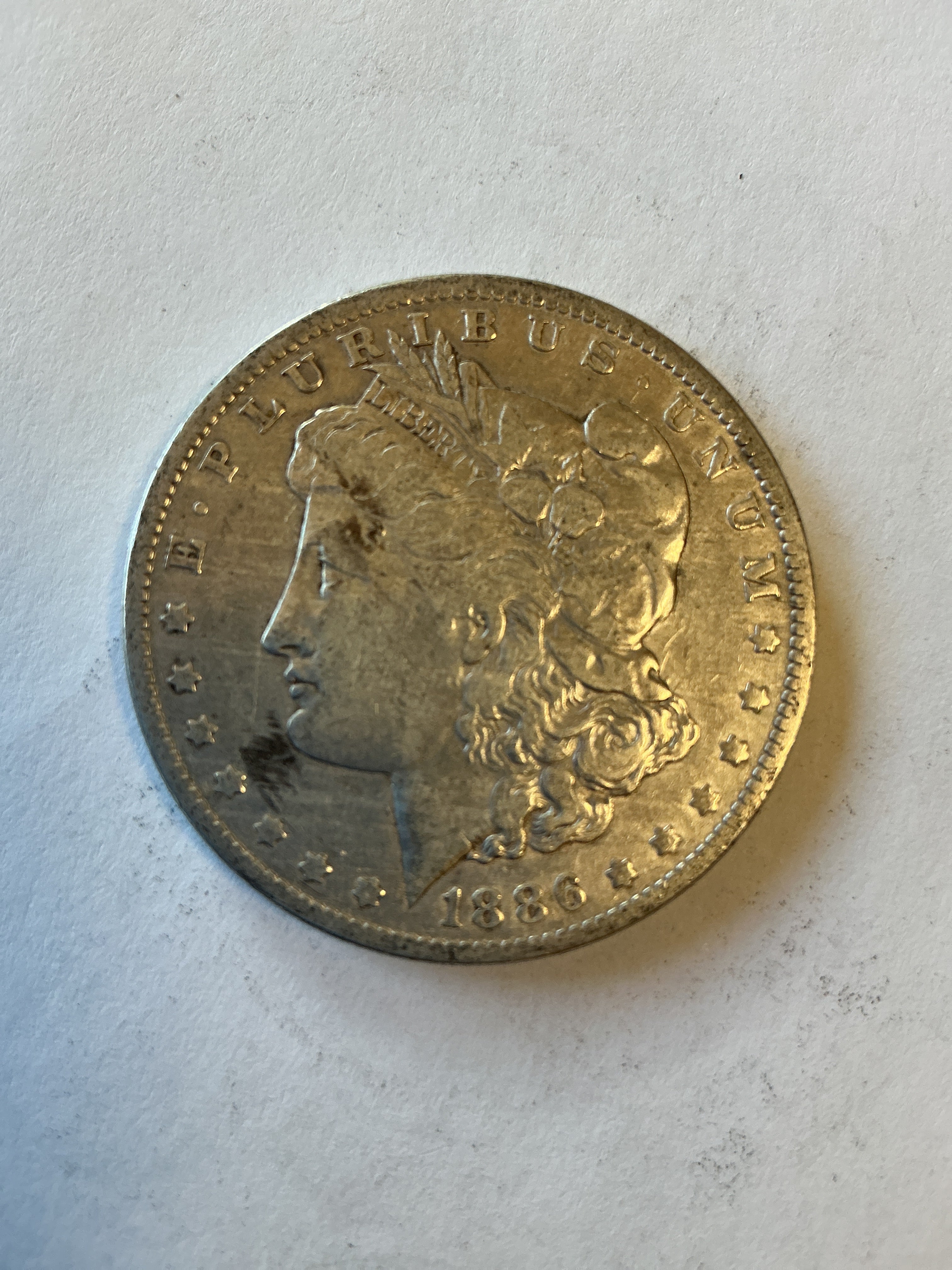 Lot 25 1886 O Morgan silver dollar, xf