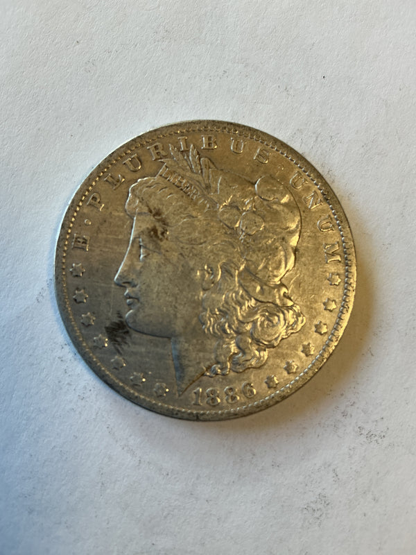 Lot 25 1886 O Morgan silver dollar, xf