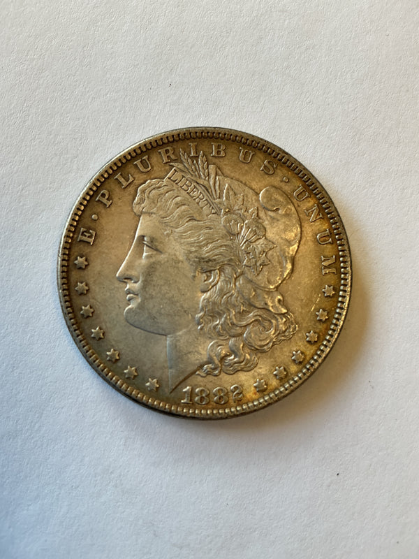Lot 8 1882 Morgan silver dollar, AU