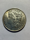 Lot 12, 1900 O Morgan silver dollar, AU