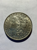 Lot 48, 1883 O Morgan silver dollar, AU