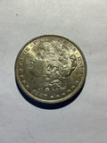 Lot 23, 1887 Morgan silver dollar, AU