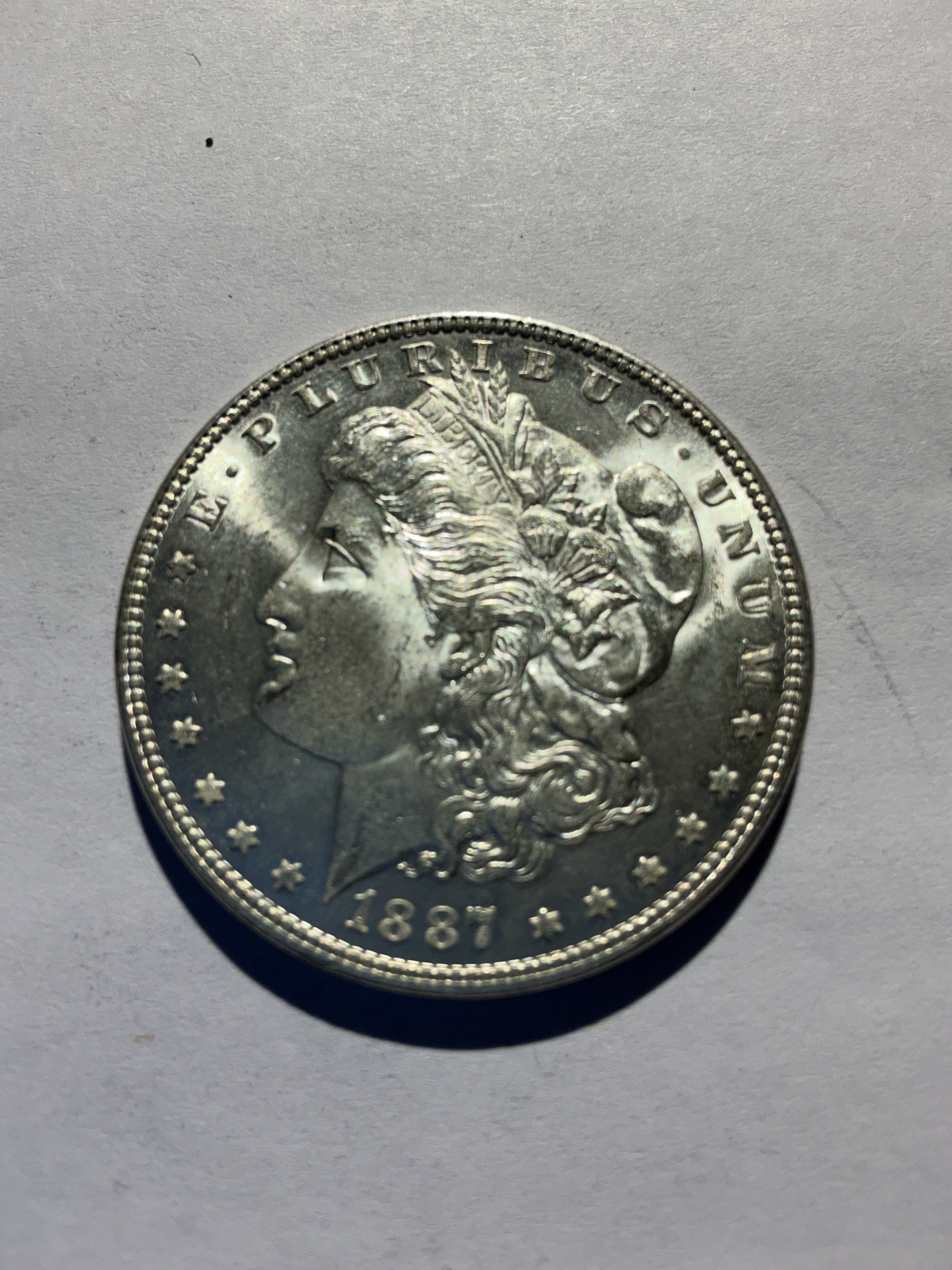 Lot 43, 1887 Morgan silver dollar, BU