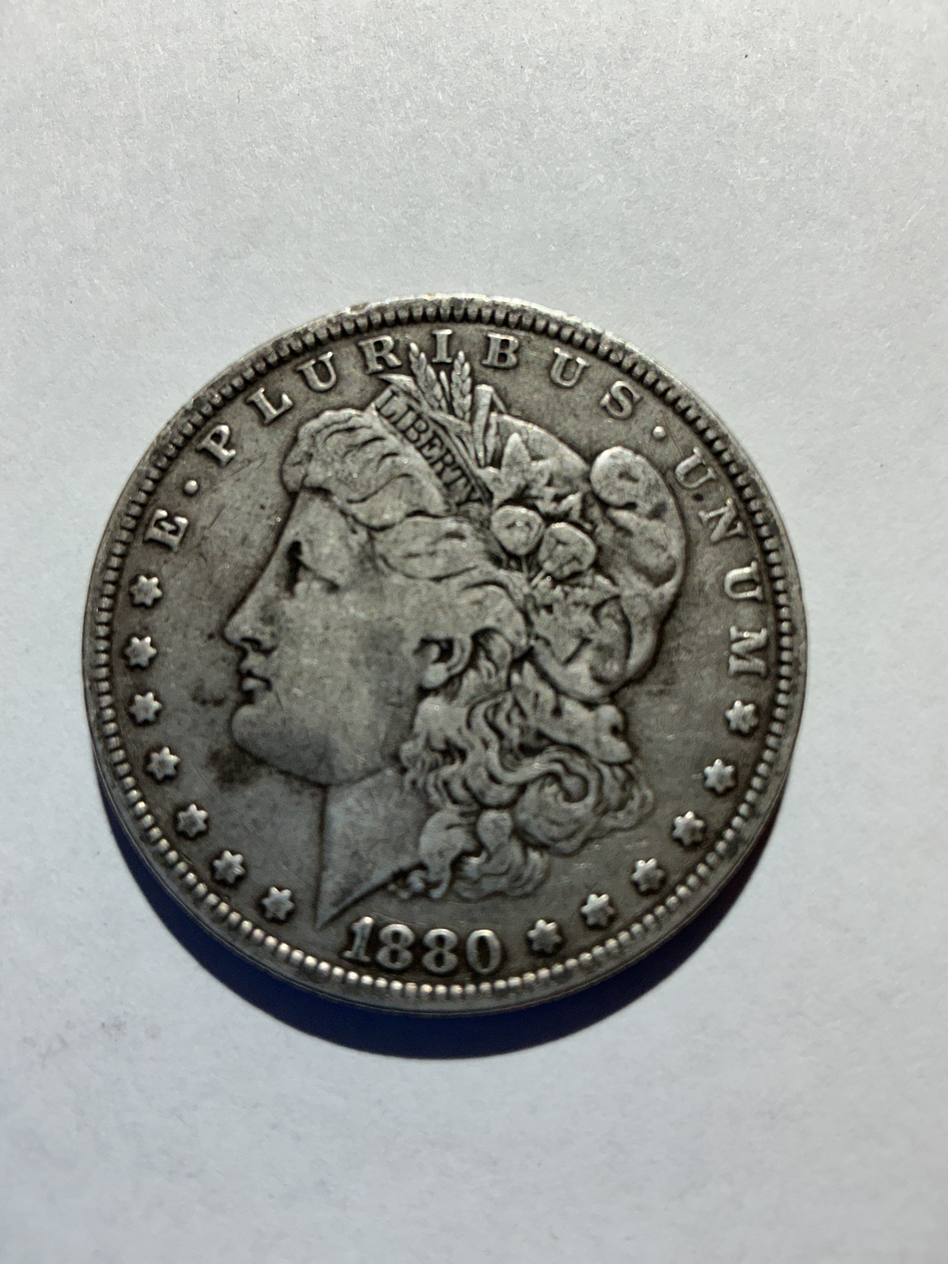 Lot 26, 1880 Morgan silver dollar, F
