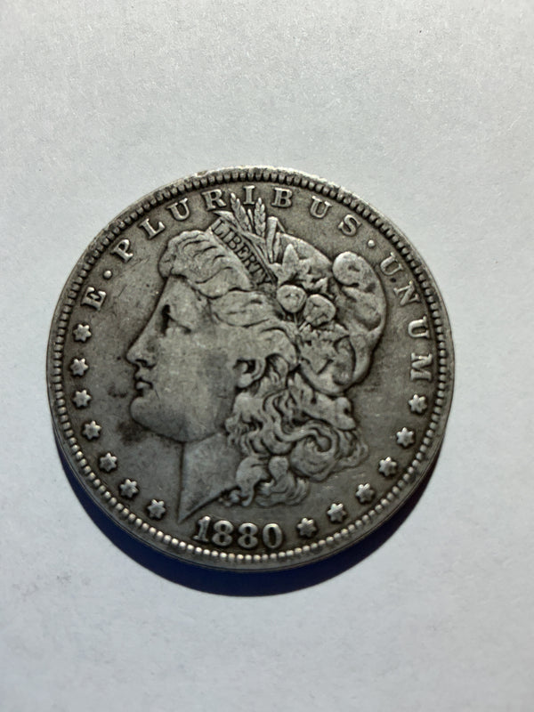 Lot 26, 1880 Morgan silver dollar, F