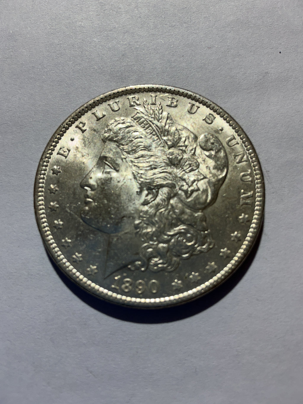 Lot 74, 1890 Morgan silver dollar, BU