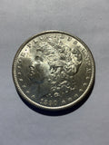 Lot 74, 1890 Morgan silver dollar, BU
