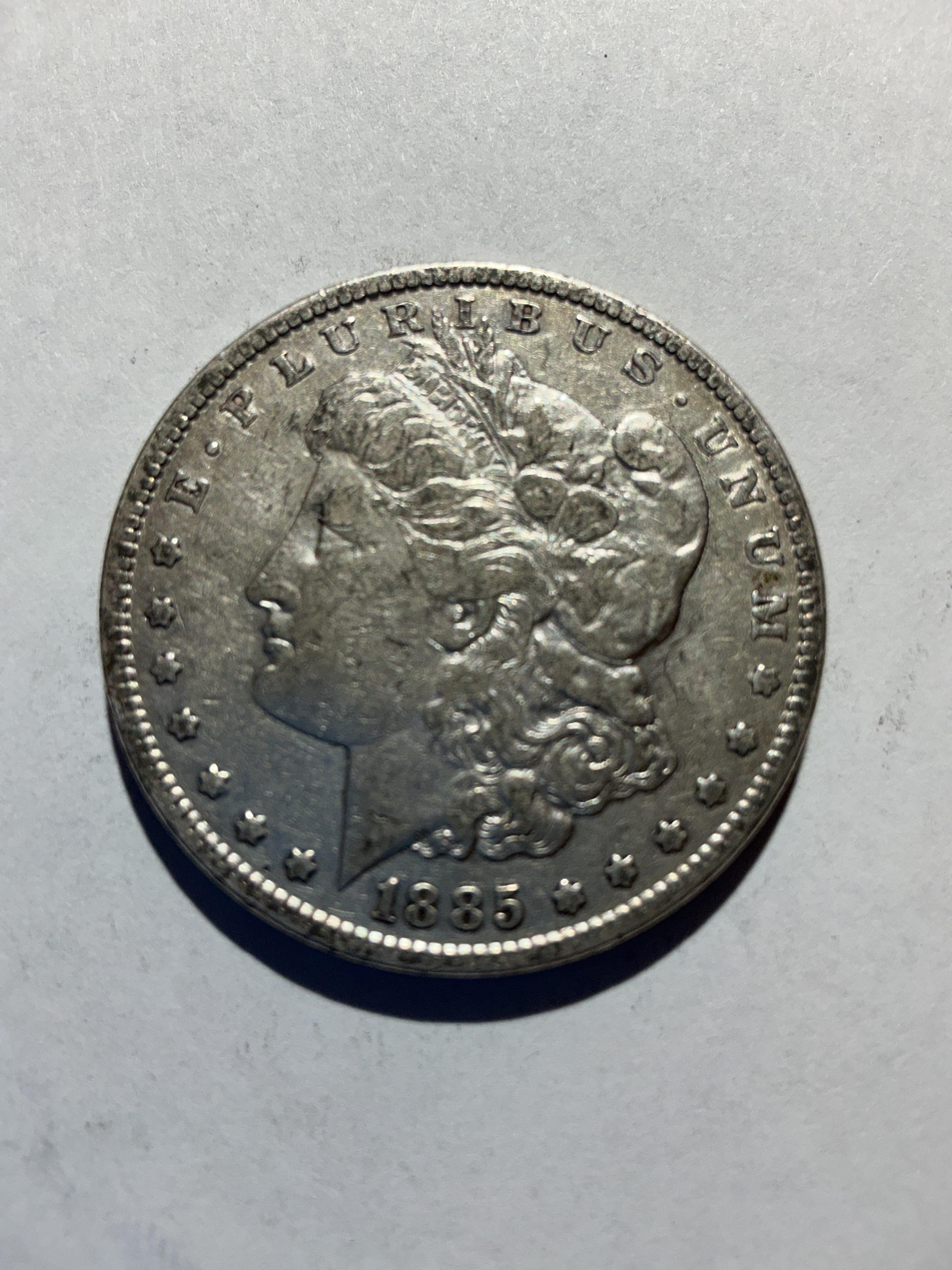 Lot 35, 1885 Morgan silver dollar, VG
