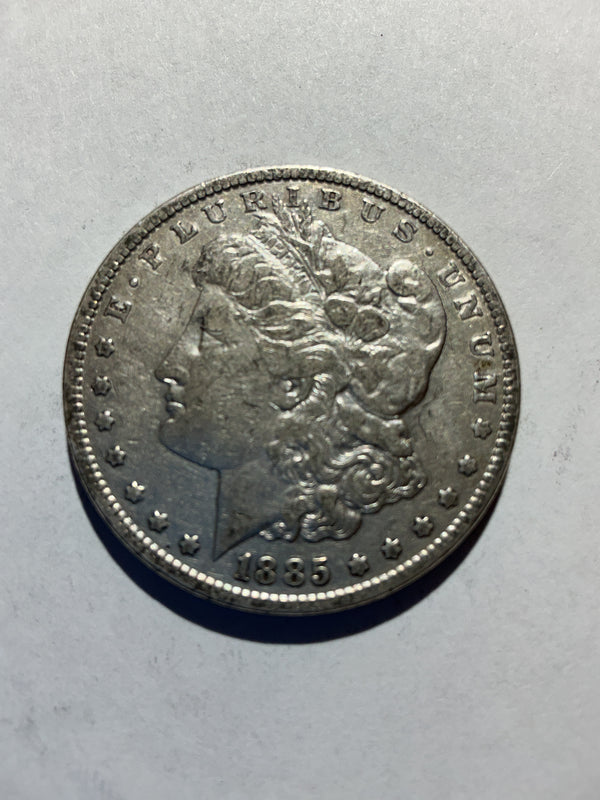 Lot 35, 1885 Morgan silver dollar, VG