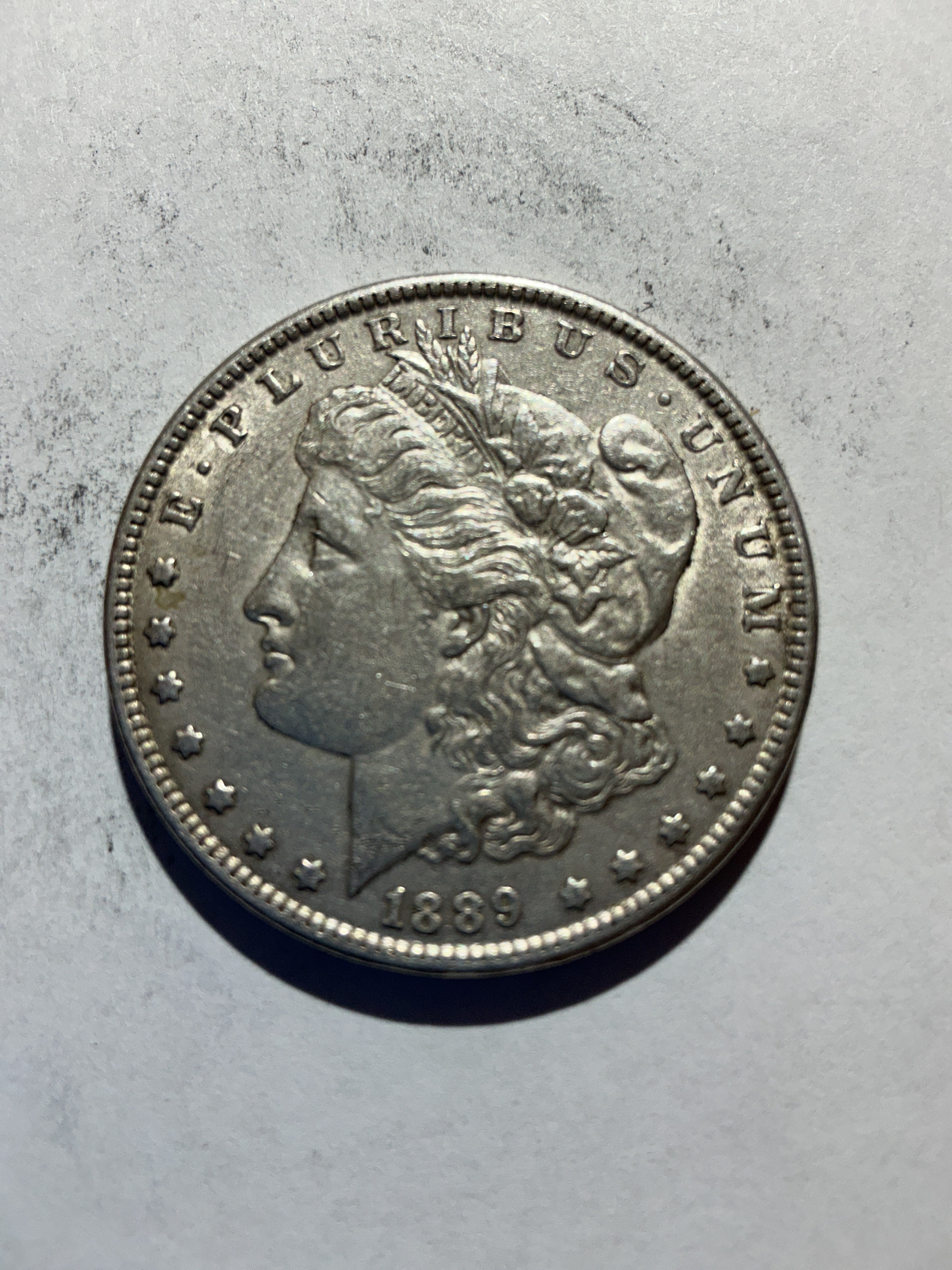 Lot 78, 1889 Morgan silver dollar, vf