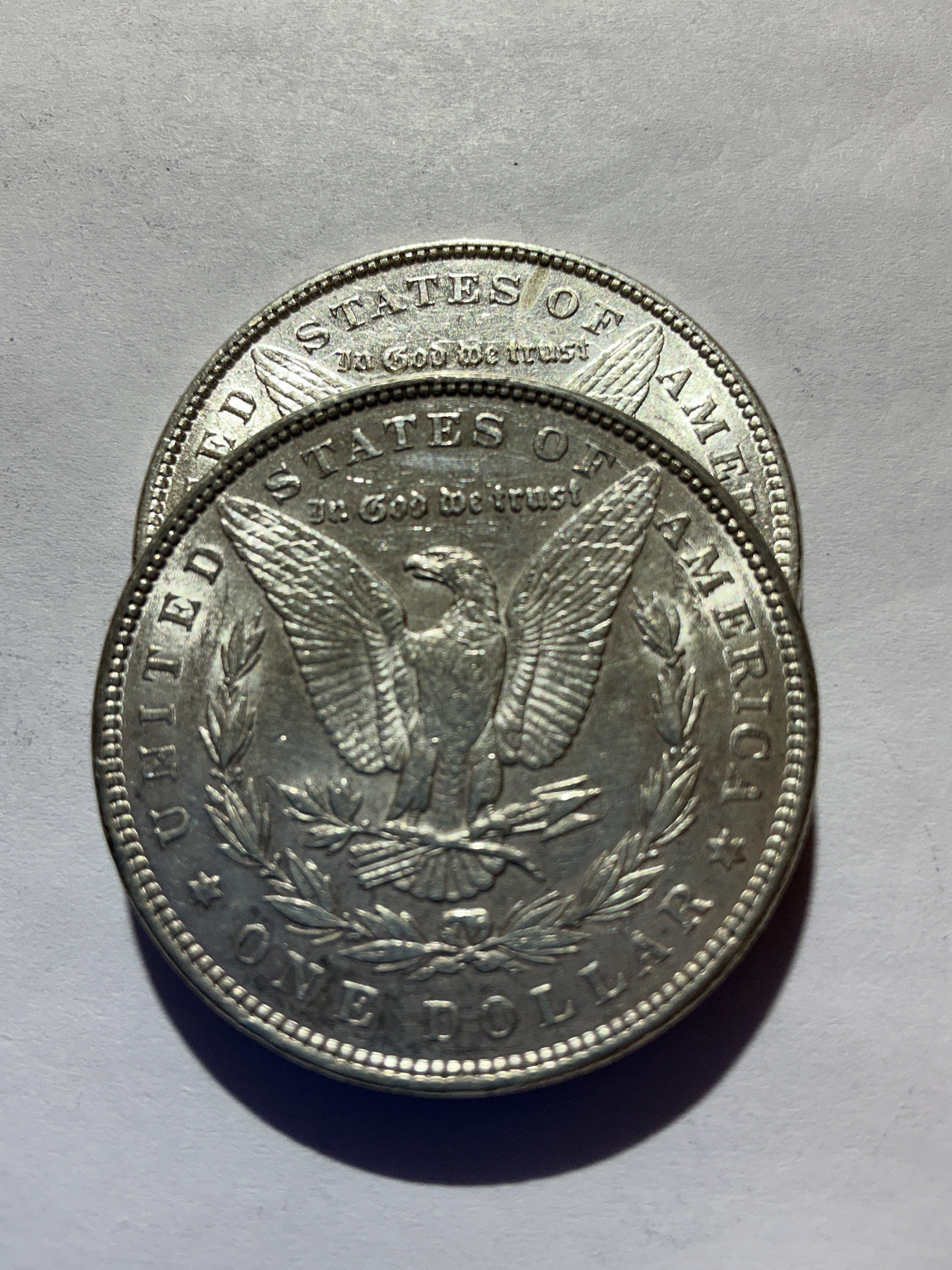 Lot 51, 2 1885 Morgan silver dollar, AU
