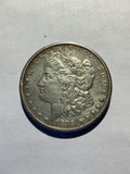 Lot 10, 1878 CC Morgan silver dollar, Xf