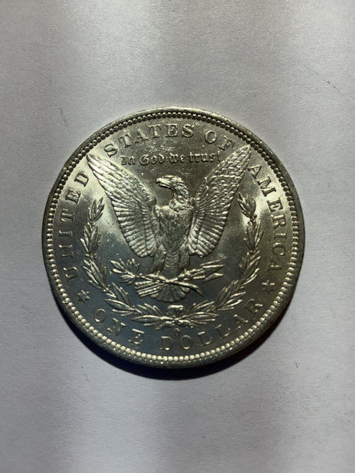 Lot 10, 1885 O Morgan silver dollar, AU