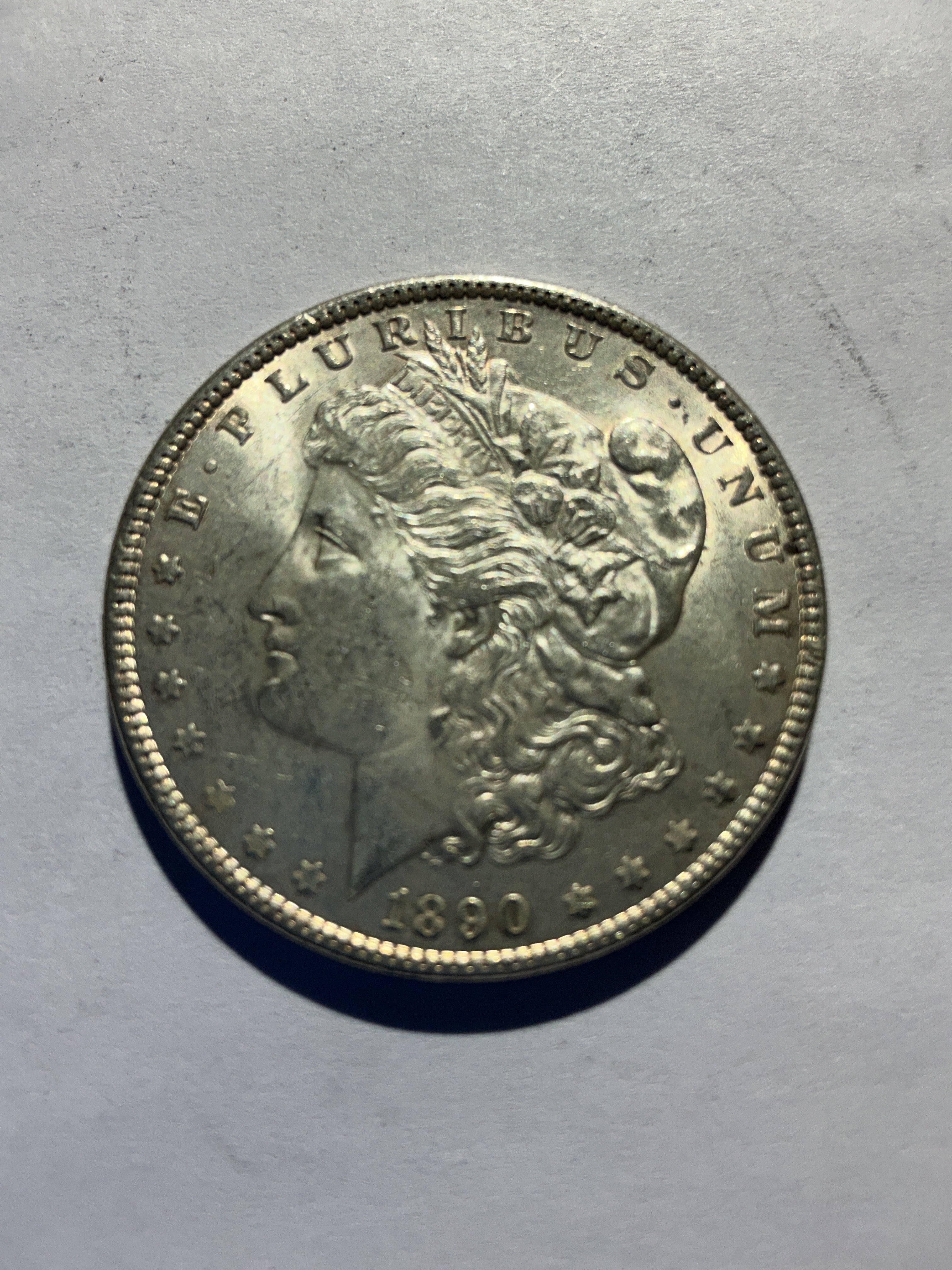 Lot 57, 1890 Morgan silver dollar, AU